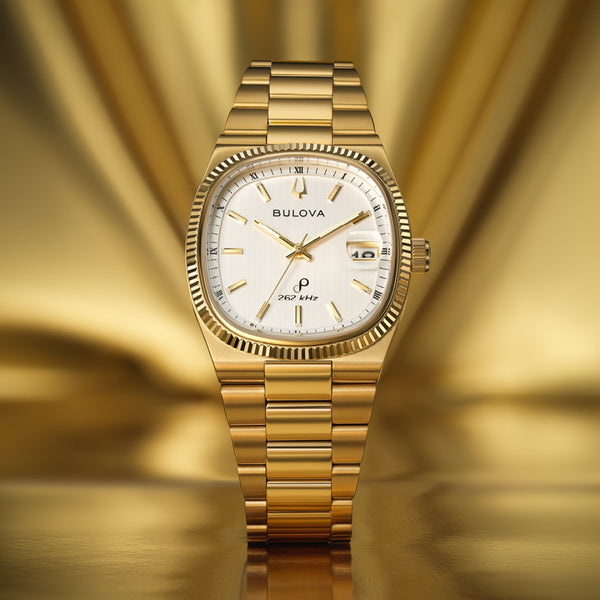 Bulova Super Seville with 38MM Silver-White Cushion Shaped Dial and Goldtone Stainless Steel Band. 97B223