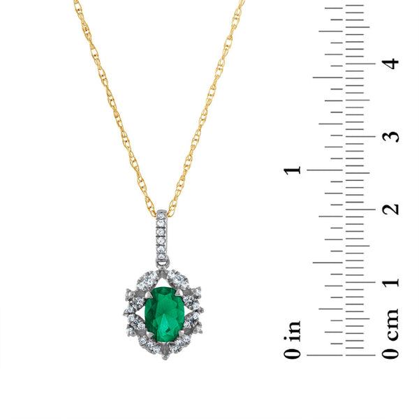 7X5MM Oval Emerald and Diamond Halo Pendant in 10KT Yellow Gold