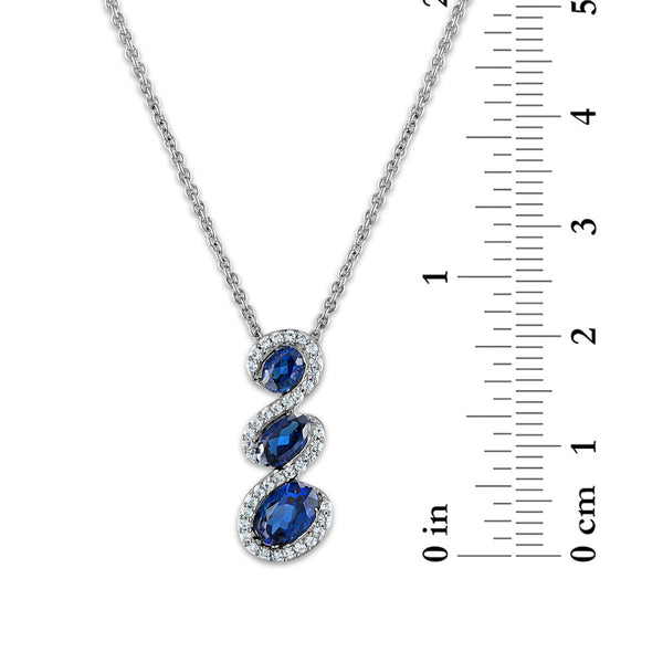 Oval Ceylon Sapphire and White Sapphire Halo Three Stone 18-inch Pendant in Rhodium Plated Sterling Silver